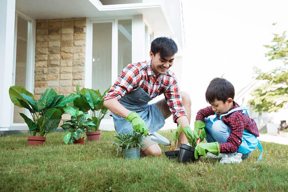 father and child gardening