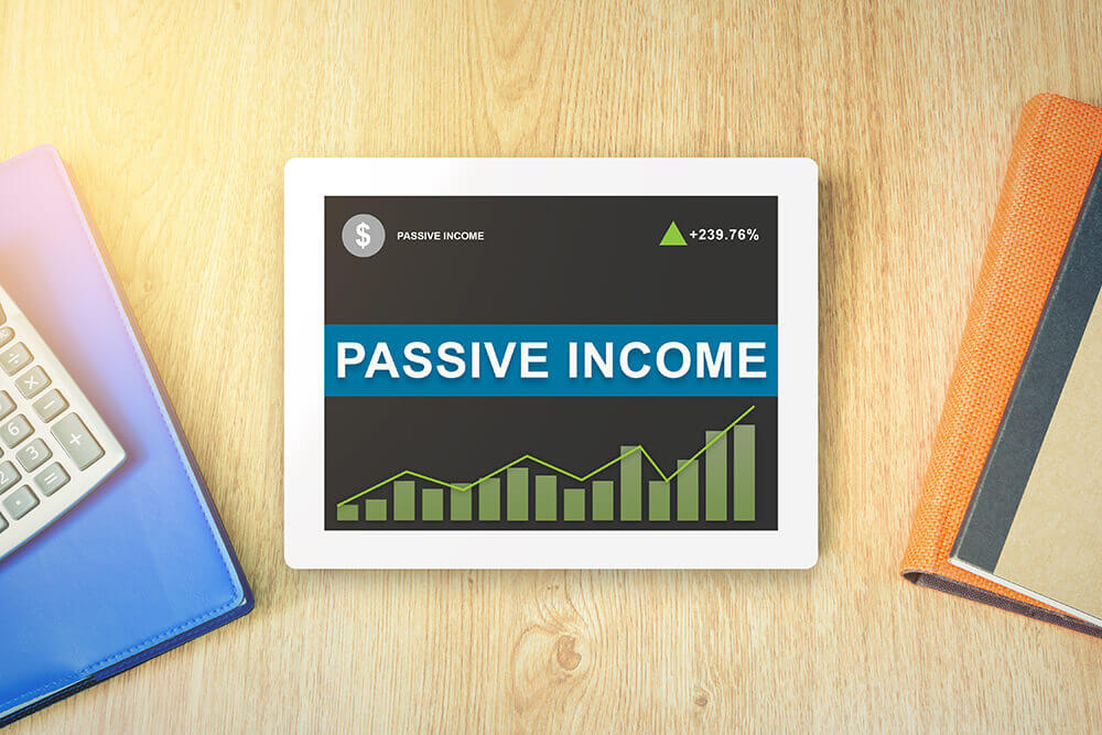 tablet reading 'pasive income'