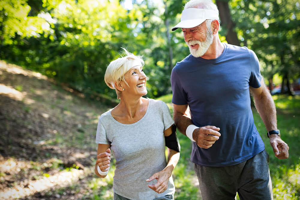 senior couple jogging